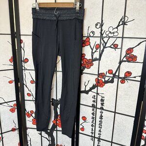 Athleta Womens Rainier Tight Legging Size XS Black Zip Pockets Reflective